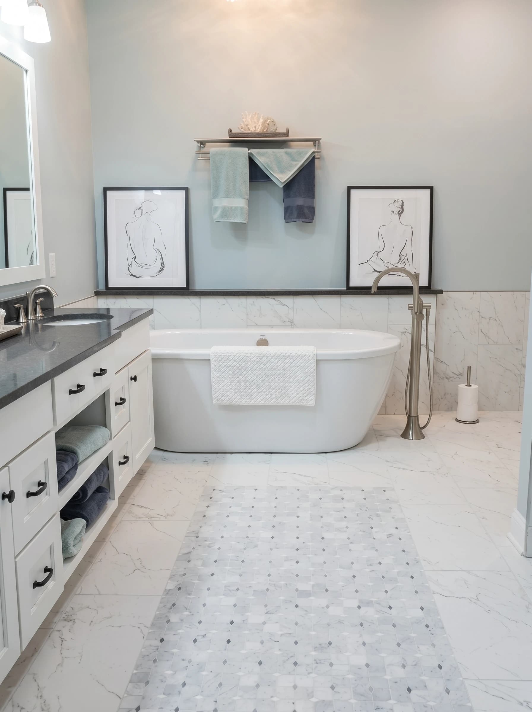 A large bathroom with a modern design featuring marble floors and blue walls.