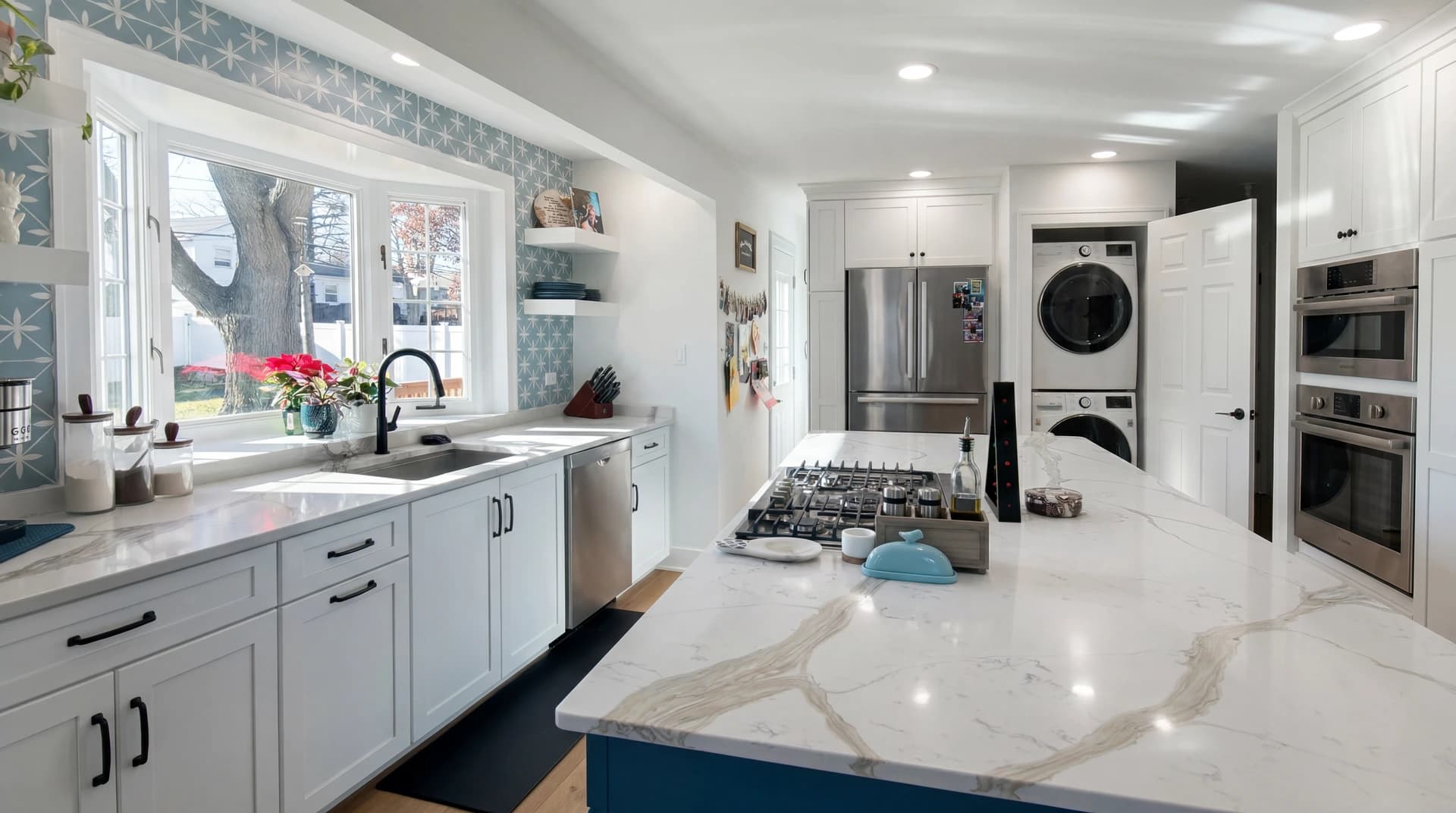 Elegant kitchen with modern appliances and granite countertops.